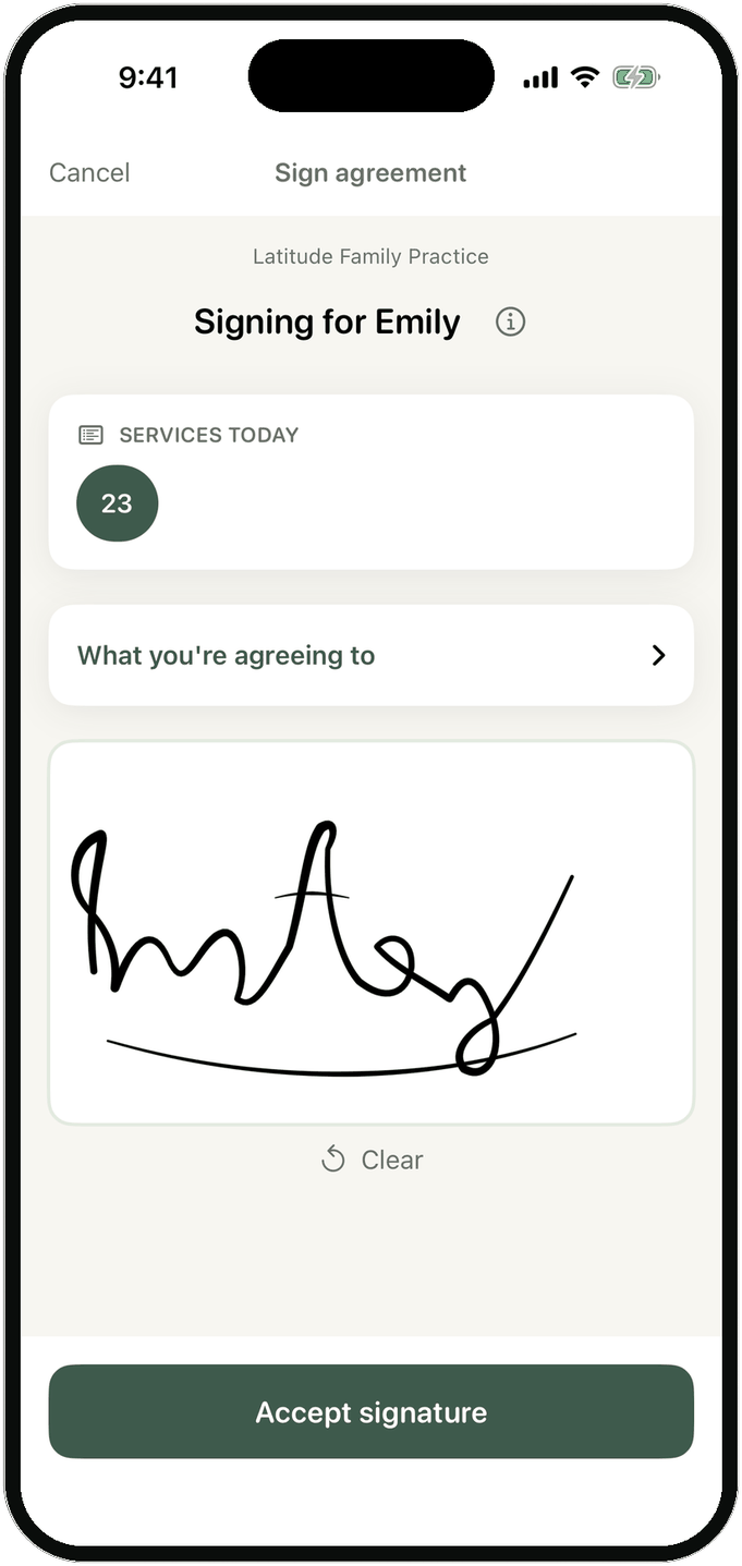 Patient signing an Assignment of Benefit agreement on-screen with a finger